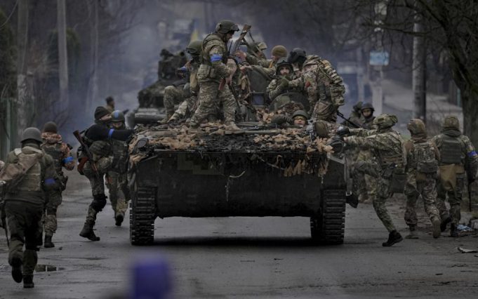 Ukrainian forces retake areas near Kyiv amid fear of traps.